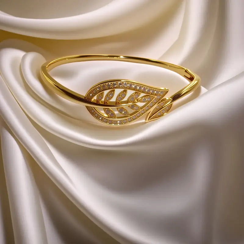Radiant Brilliance Women's Golden-Tone Leaf Design Bracelet - 3D Inlay & Metal Mirror Finish.