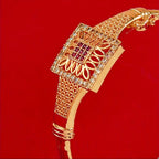 Vintage Dubai-Inspired Golden-Tone Copper Bracelet with Pinkish-Red Cubic Synthetic Zirconia Stones.