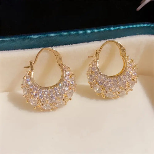 Elegant and luxurious 14K gold-plated earrings set with shiny Zirconia -
