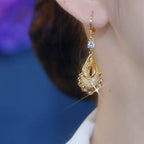 1 Pair of Golden Mesh Rhinestone Teardrop Stud Earrings.