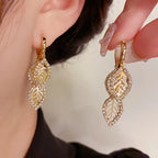 Elegant Drop Earrings Golden Leaf Design.