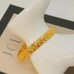 Elegant 24K Gold-Plated Copper Bangle Bracelet with Heart Charm.