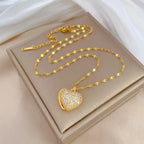 1pc 18K Golden Plated Heart-Shaped Clasp Pendant Necklace with Synthetic Zirconia.