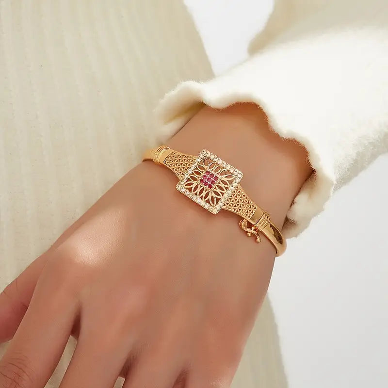 Vintage Dubai-Inspired Golden-Tone Copper Bracelet with Pinkish-Red Cubic Synthetic Zirconia Stones.