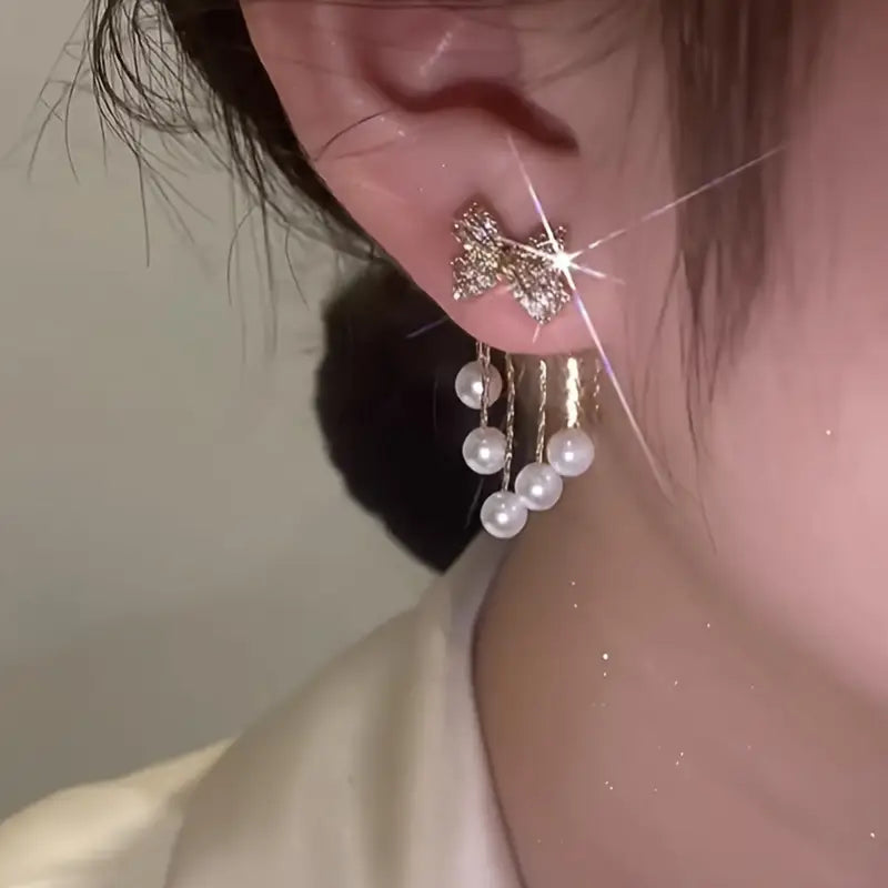 Faux Pearl Tassel Bow Decor Stud Earrings.