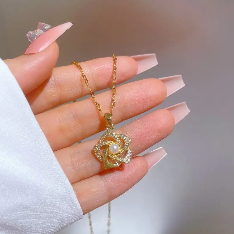 Stainless Steel Golden-Plated Micro-Set Synthetic Zirconia & Rotating Floral Pendant Necklace.