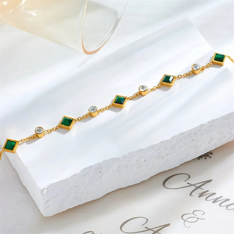 Elegant Stainless Steel Bracelet with Green Square Synthetic Zirconia, Minimalist Design.
