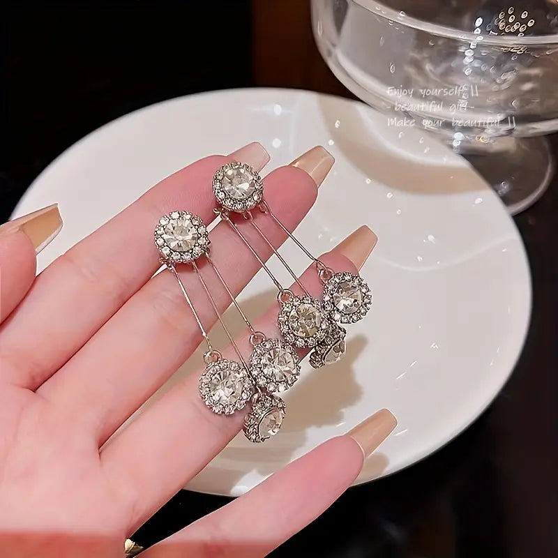 Exquisite Multi-Layered Synthetic Synthetic Zirconia Earrings.
