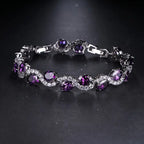 Radiant Luxury Purple Oval Link Bracelet - Exquisite Silvery Craftsmanship with Dazzling Zirconia Stones.