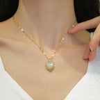 1pc 18K Golden Plated Heart-Shaped Clasp Pendant Necklace with Synthetic Zirconia.