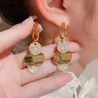 Elegant Boho-Chic Long Tassel Earrings with Sparkling Rhinestones.