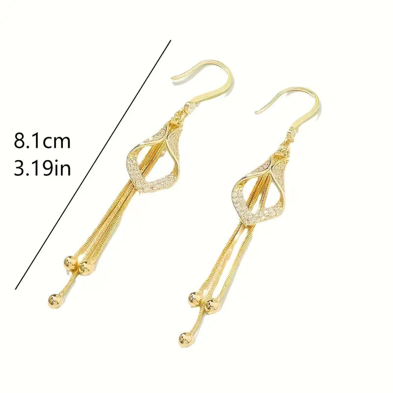 Elegant Golden Geometric Tassel Earrings with Sparkling Cubic Zirconia.