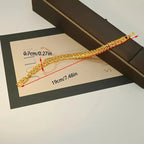 Elegant 24K Gold-Plated Copper Bangle Bracelet with Heart Charm.