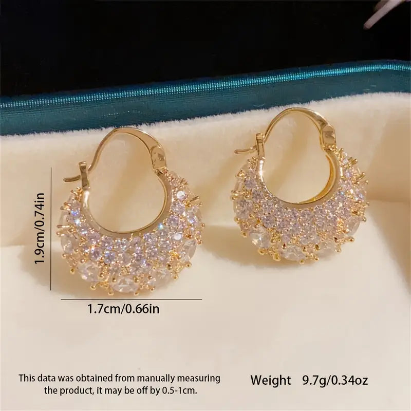 Elegant and luxurious 14K gold-plated earrings set with shiny Zirconia -.