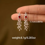 Pair of Elegant White Golden Zirconia Stud Earrings for Women.