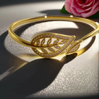 Radiant Brilliance Women's Golden-Tone Leaf Design Bracelet - 3D Inlay & Metal Mirror Finish.