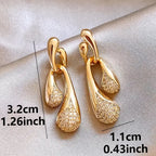 1 Pair Elegant Golden-Tone Drop Earrings with Sparkling Water Droplet Design.