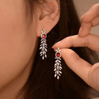 Pair of Elegant White Golden Zirconia Stud Earrings for Women.