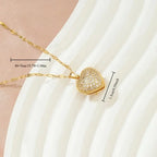 1pc 18K Golden Plated Heart-Shaped Clasp Pendant Necklace with Synthetic Zirconia.