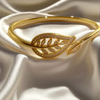 Radiant Brilliance Women's Golden-Tone Leaf Design Bracelet - 3D Inlay & Metal Mirror Finish.