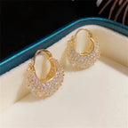 Elegant and luxurious 14K gold-plated earrings set with shiny Zirconia -.