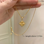 Vintage Style Twisted Double-Sided Clover Necklace with 18K Golden Plated Copper and Synthetic Zirconia -.