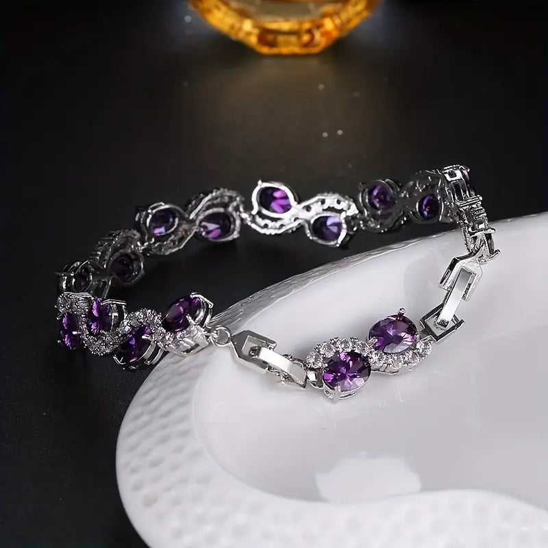 Radiant Luxury Purple Oval Link Bracelet - Exquisite Silvery Craftsmanship with Dazzling Zirconia Stones.