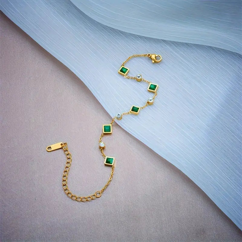 Elegant Stainless Steel Bracelet with Green Square Synthetic Zirconia, Minimalist Design.