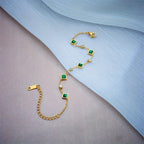 Elegant Stainless Steel Bracelet with Green Square Synthetic Zirconia, Minimalist Design.