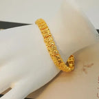 Elegant 24K Gold-Plated Copper Bangle Bracelet with Heart Charm.