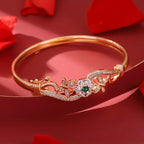 legant Golden-Tone Butterfly Open Bangle Bracelet with Sparkling Synthetic Zirconia & Floral Design.