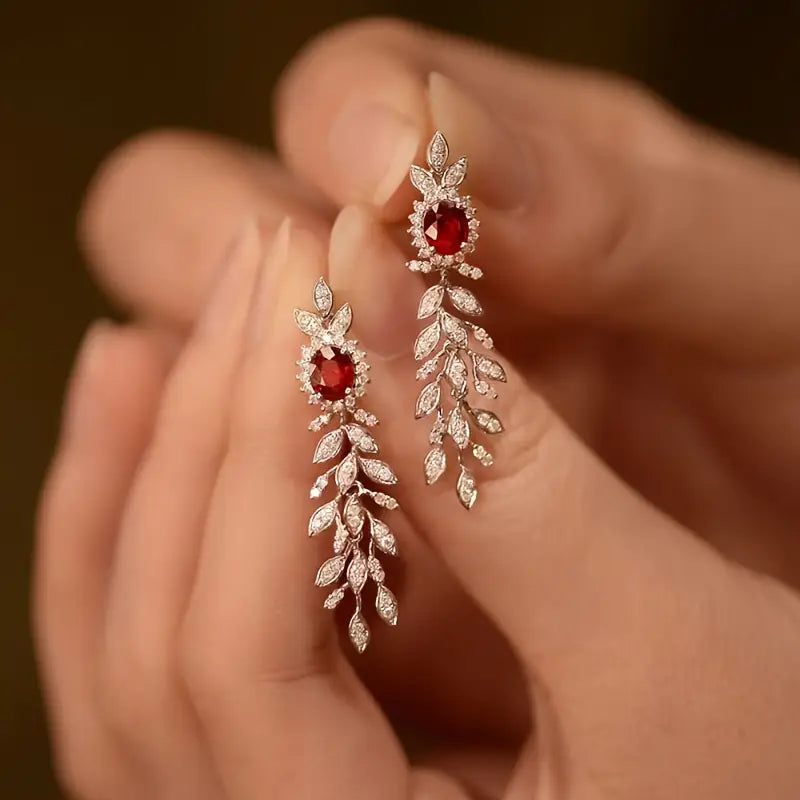 Pair of Elegant White Golden Zirconia Stud Earrings for Women.