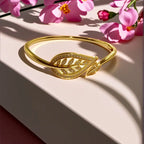 Radiant Brilliance Women's Golden-Tone Leaf Design Bracelet - 3D Inlay & Metal Mirror Finish.