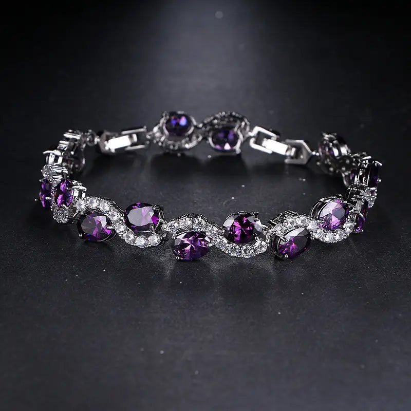 Radiant Luxury Purple Oval Link Bracelet - Exquisite Silvery Craftsmanship with Dazzling Zirconia Stones.