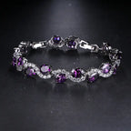 Radiant Luxury Purple Oval Link Bracelet - Exquisite Silvery Craftsmanship with Dazzling Zirconia Stones.