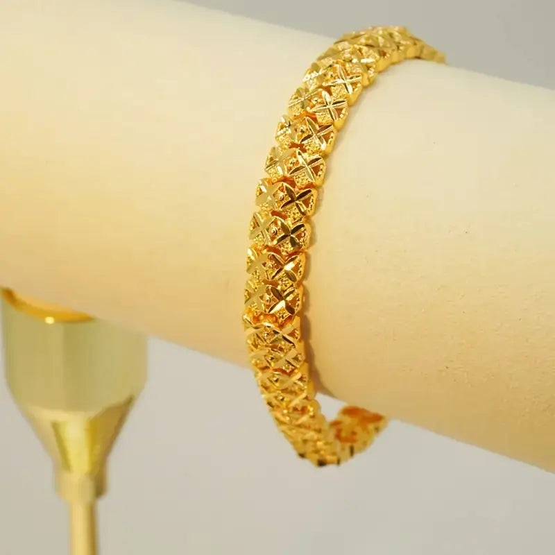 Elegant 24K Gold-Plated Copper Bangle Bracelet with Heart Charm.
