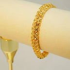 Elegant 24K Gold-Plated Copper Bangle Bracelet with Heart Charm.