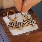 Pair of Elegant Rhombus Full Rhinestone Earrings for Women.
