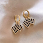 Pair of Elegant Rhombus Full Rhinestone Earrings for Women.