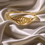 Radiant Brilliance Women's Golden-Tone Leaf Design Bracelet - 3D Inlay & Metal Mirror Finish.