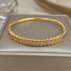 1pc Golden-Tone Rhinestone Cuff Bracelet - Luxurious, Retro Style with Sparkling Cubic Zirconia Stones.