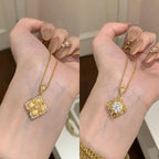 Vintage Style Twisted Double-Sided Clover Necklace with 18K Golden Plated Copper and Synthetic Zirconia -.